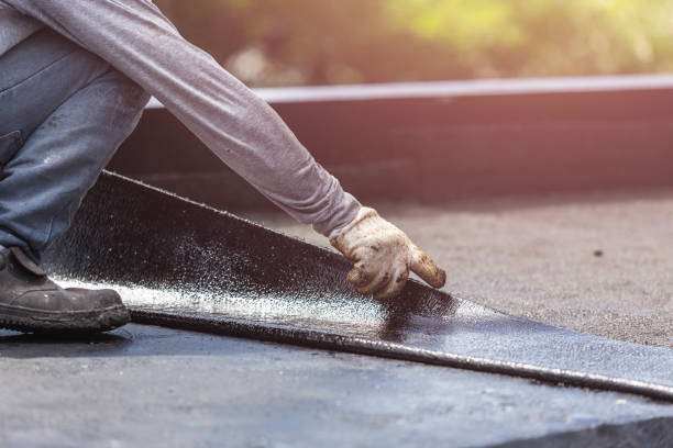Professional Basement Waterproofing technician working in Jasonville, IN